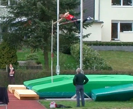 Wolfie clears M60 WR 4.11 in May 1 meet where homes overlook vault.