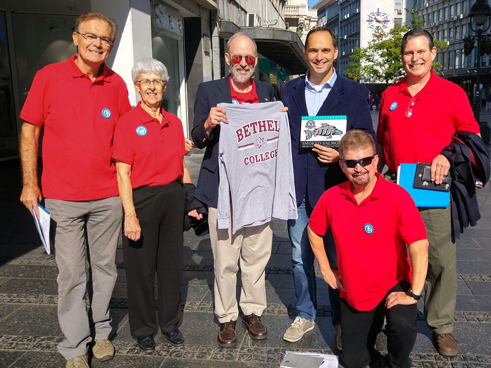 Dave (with shirt) and fellow members of the U.S. team at Serbian event.
