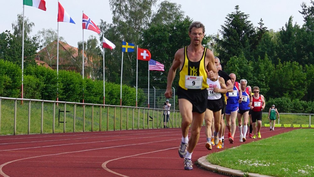 Rolf leads the 1500 on windy Sunday during M70 dec world record.