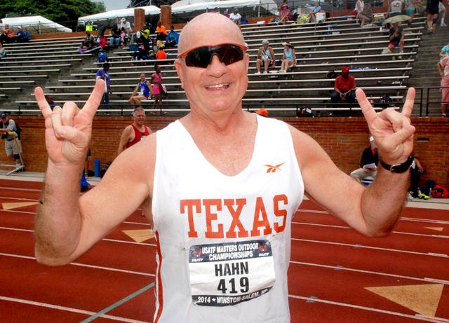 Bob Hahn displays hook 'em horns at 2014 North Carolina masters nationals.
