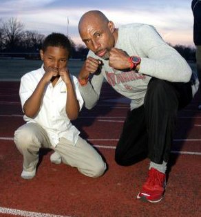 Lonnie stays in fighting shape with son Andrew.